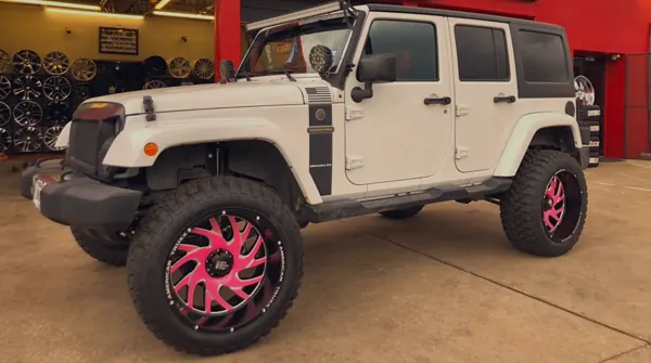 Jeep wrangler &middot; 22" American truxx wheels &middot; Wrap / chrome delete &middot; Accessories