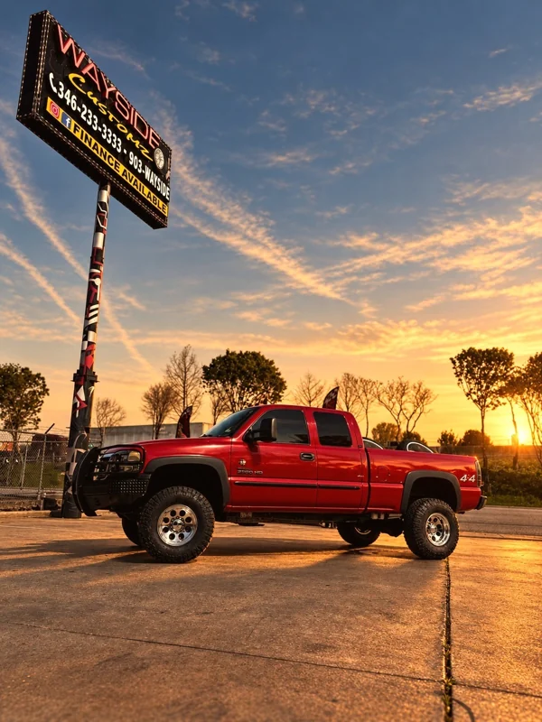 2006 GMC Sierra 2500 · 16" Ion Wheels · 4" Rough Country Lift Kit
