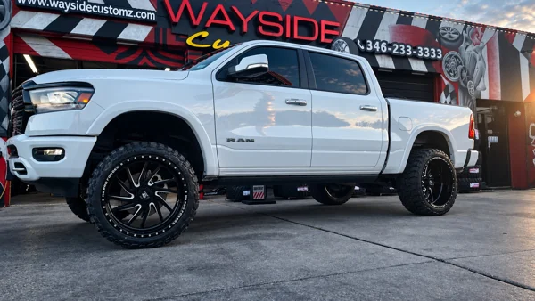 2021 Ram 1500 · 24" HD Pro Forged Wheels · 6" Rough Country Lift