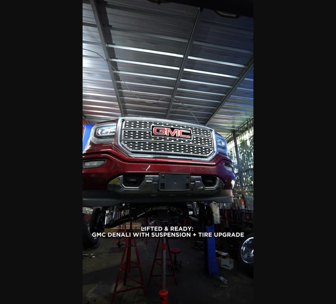 GMC Denali receiving a lift, wheel and tire upgrade at Wayside Customz in Houston